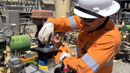 Electrician carrying out industrial electrical maintenance