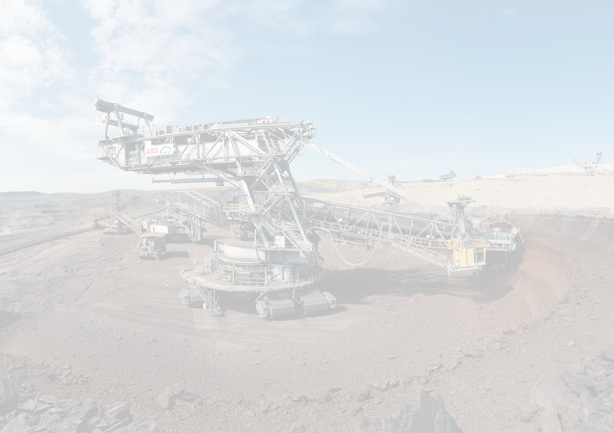 Large excavator and conveyor equipment in an open-cut mine